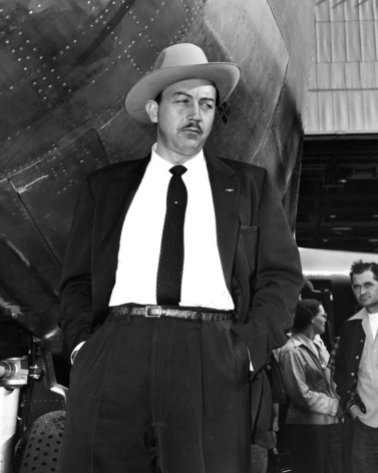 In this image taken circa 1954, Boeing test pilot Alvin M. "Tex" Johnston in the Stetson hat he liked to wear. Along with his cowboy style of dress, his maverick behavior is said to have inspired the creation of Dr. Strangelove's Maj. T.J. "King" Kong character, who, in rodeo style, rode a balky nuclear weapon to its target.